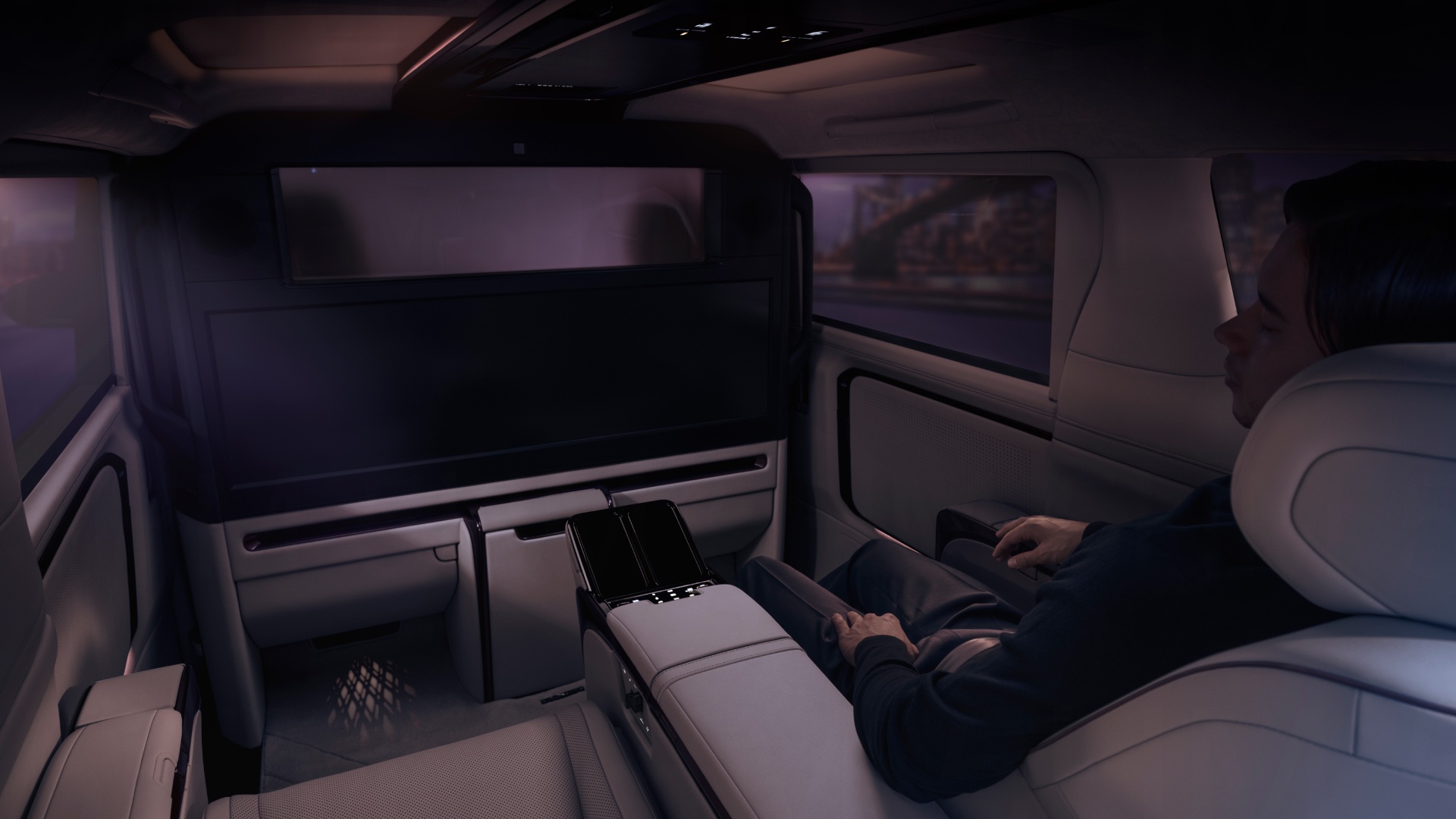 Nighttime interior shot of the rear passenger view inside the LM.
