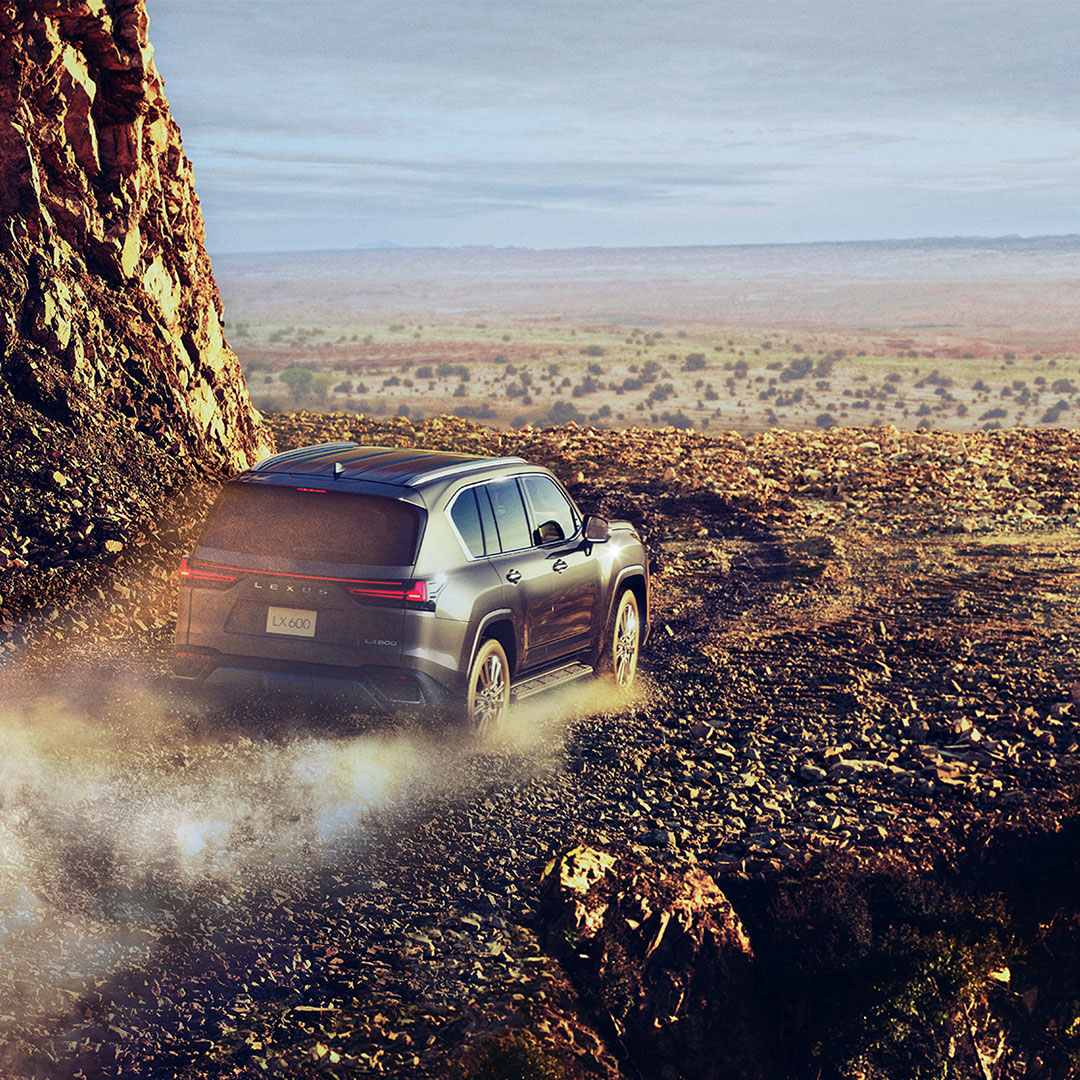 Lexus LX on a rocky desert clifftop