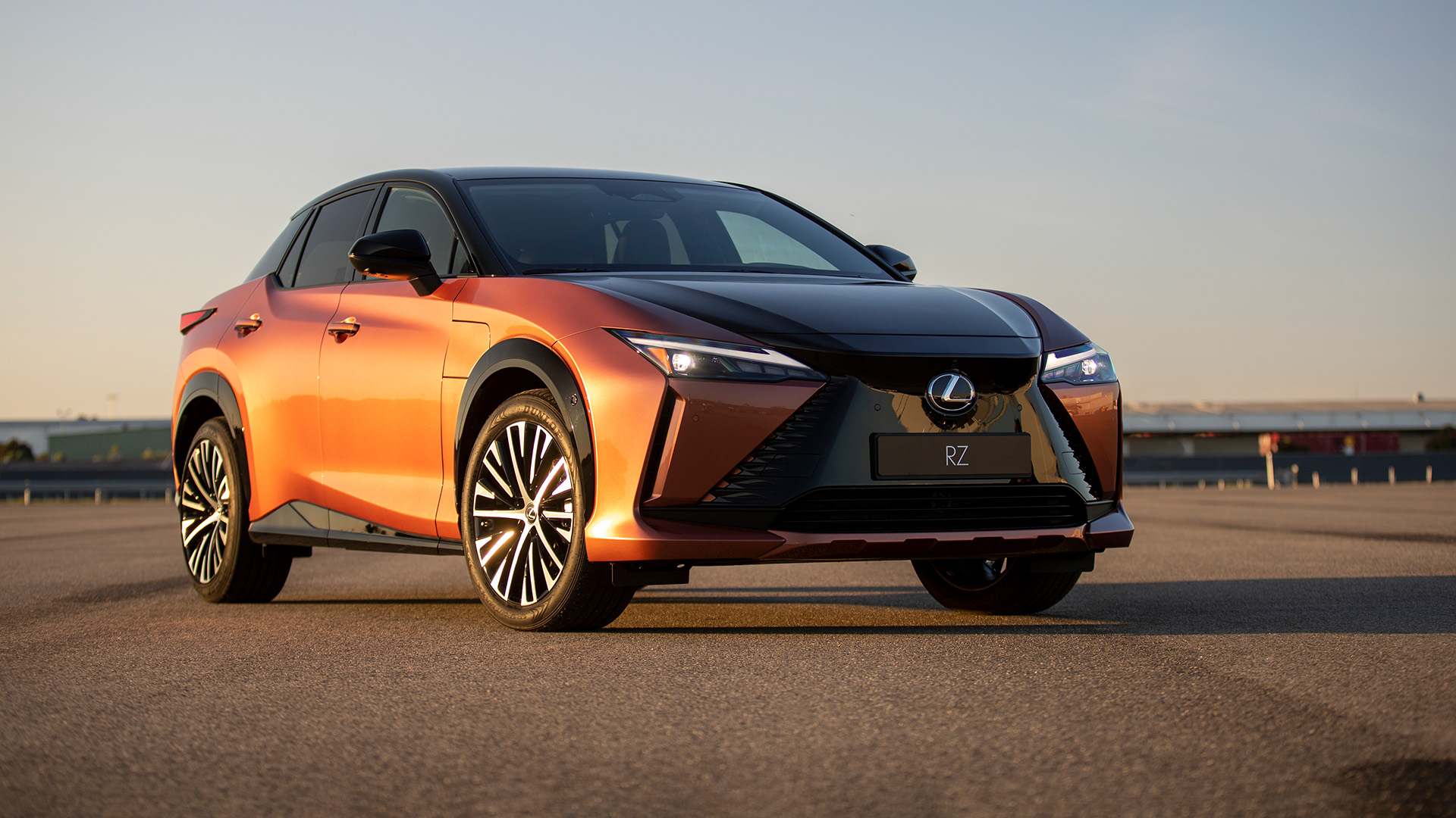 An orange Lexus RZ 450e