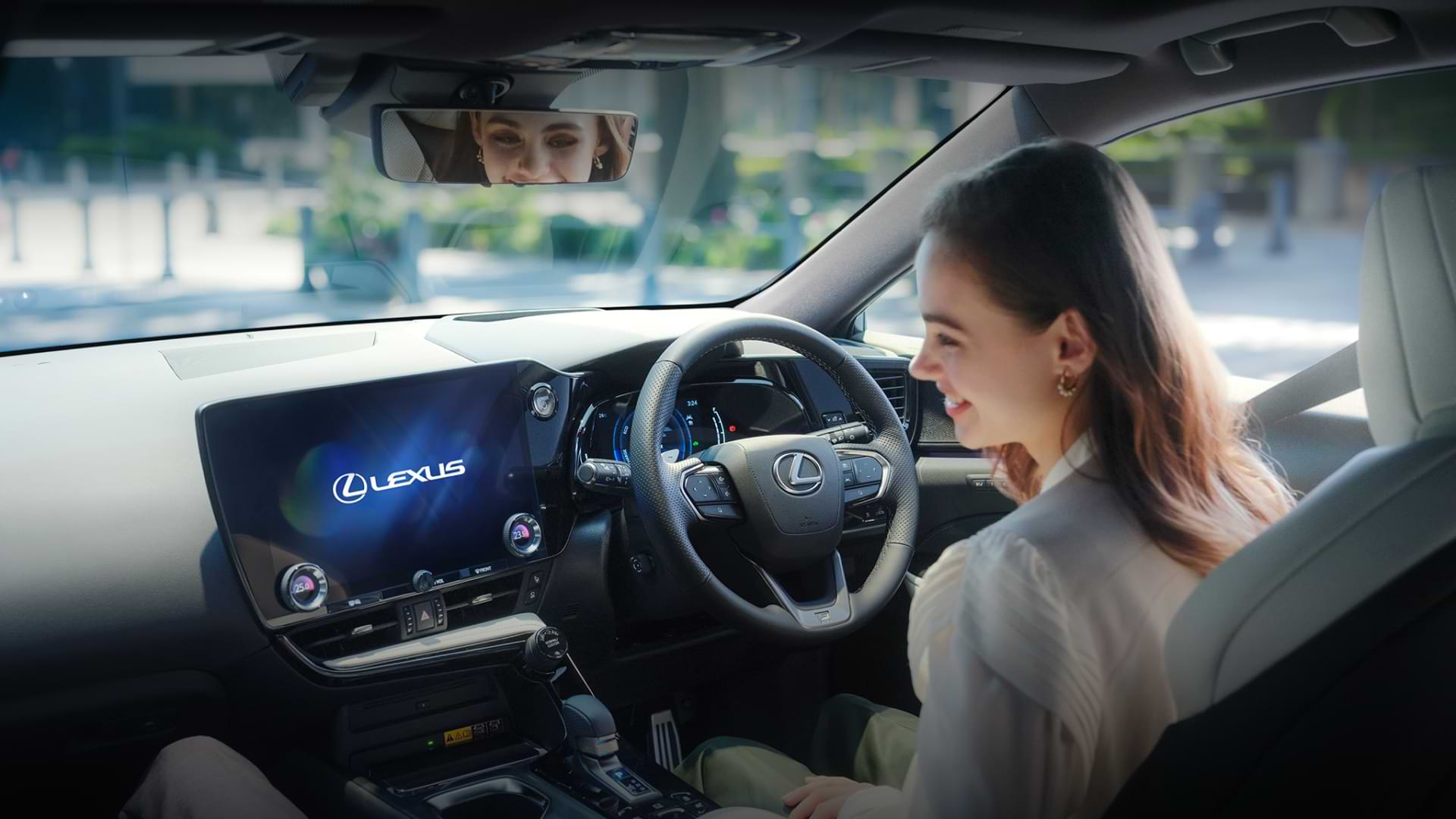 Lady sits in a 2022 NX